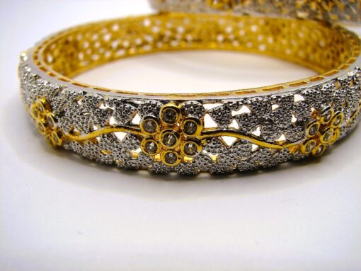 Gold Plated Bangles With Intricate Detailing