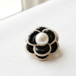 Black Flower Brooch Pakistan by dango