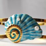 gold plated stainless steel shell bangle cuff for women in Pakistan by Dango