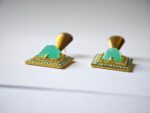 Close-up of Jahan earrings — layered sage green centre stone, micro zircon halo and turquoise bead border, ethnic handmade jewelry Pakistan Dango