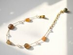 Khwaab natural agate bracelet — gold plated steel chain with honey peach and smoky agate tumble stones, Meraki collection by Dango Pakistan