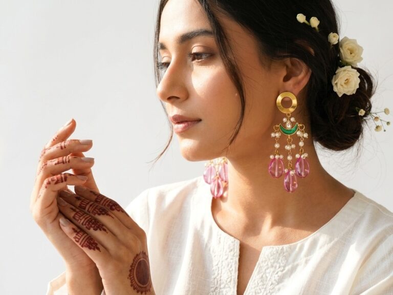 Bahar statement earrings worn — ethnic chandelier earrings gold plated, Dango Meraki collection, COD Pakistan