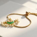 Chand kundan pearl bolo bracelet — gold plated green crescent centrepiece with faux pearl fringe, Meraki collection by Dango Pakistan