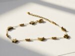 Sitaara celestial moon and star bracelet — gold plated chain with crescent moon and star charms, Meraki collection by Dango Pakistan