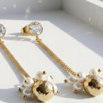 Laila hematite pearl drop earrings — gold plated zircon stud with chain and natural hematite ball crowned with pearl clusters, Meraki collection Dango Pakistan