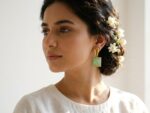 Jahan bold geometric earrings worn — sage green and gold statement earrings, Dango Meraki collection COD Pakistan