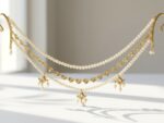 Zulf three-strand bridal hair drape jewelry — gold plated pearl strand, filigree heart chain and kundan teardrop drops, Meraki collection Dango Pakistan