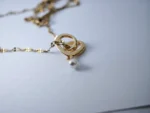 Dango Gold Plated Stainless Steel & Plated Copper Interlocking Heart Pearl Pendant Necklace, 45+5cm for Women – Delivered Across Pakistan - Image 2
